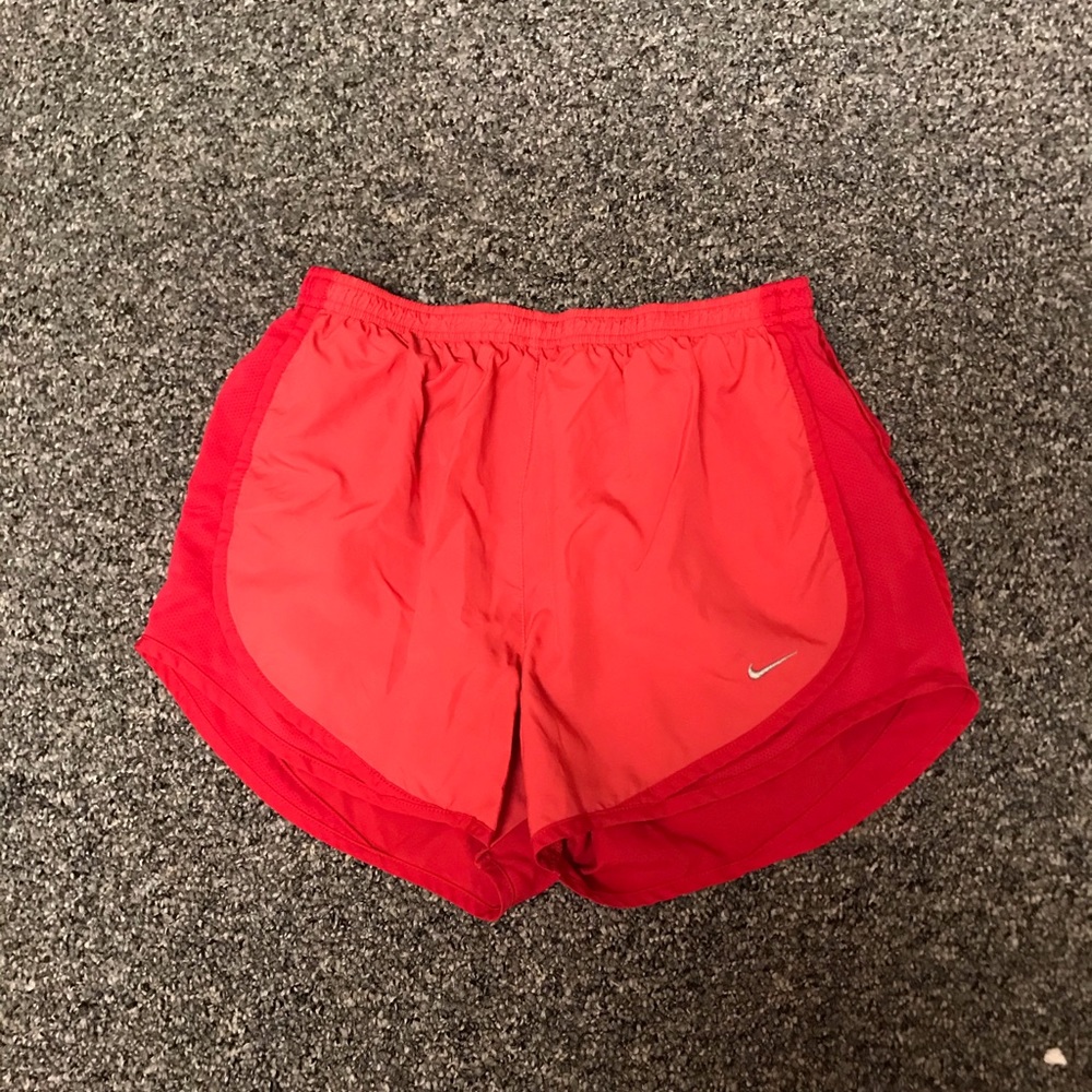 Red Nike shorts